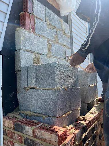 Chimney rebuilt from the shoulder up