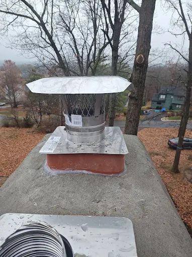 Rain soaking into an unprotected masonry chimney crown