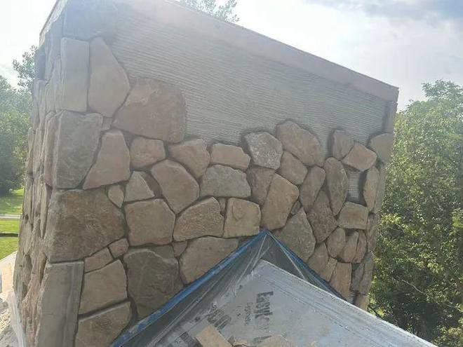 Stonework wrapping the chase