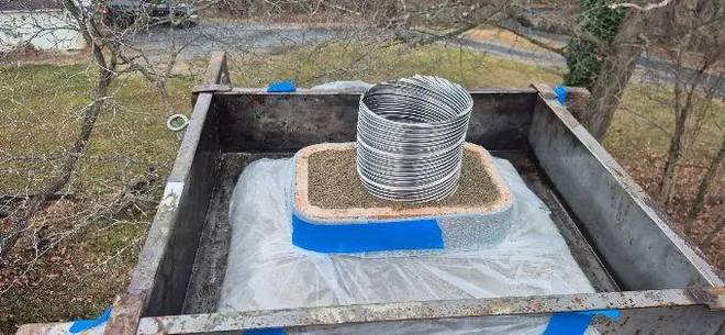 Liner coil staged on the crown