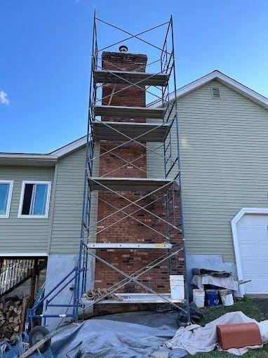 Full-height rebuild, staged and tarped