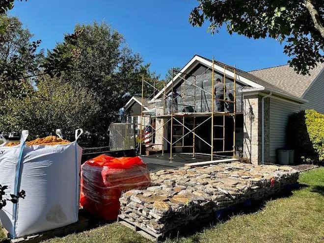 Full stone veneer  pallets on the lawn
