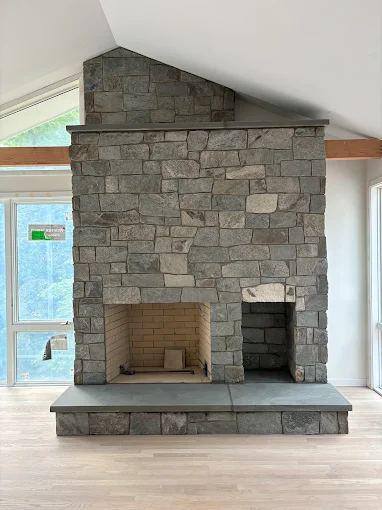 New double-sided stone fireplace